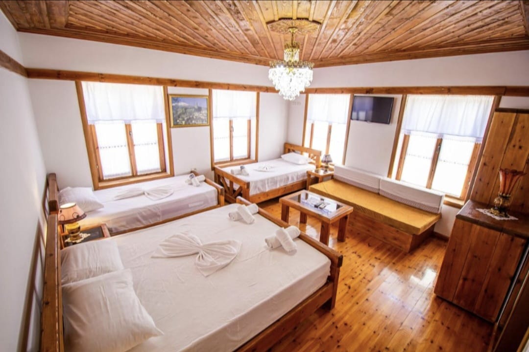 Spacious family room with seating area and mountain-view windows